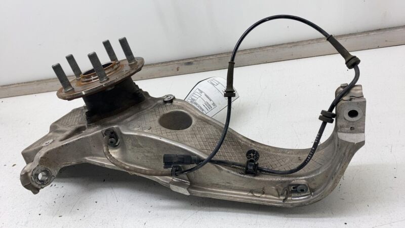 104399900A 2012-2015 Tesla Model S Front Right Spindle Knuckle Wheel Hub + ABS Sensor RWD