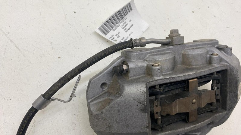 104462100E ⭕ 2017-2023 Tesla Model 3 Front Left Caliper w/ Brake Hose Line LH 1044621-00-E