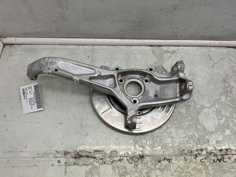 1044316 00 E 2017-2023 Tesla Model 3 Front Passenger Spindle Knuckle Rotor Shield Right RWD