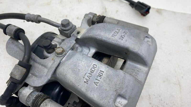 1044623 2017-2024 Tesla Model 3 Y Rear Driver Side Caliper w/ Brake Line Hose Left Assy