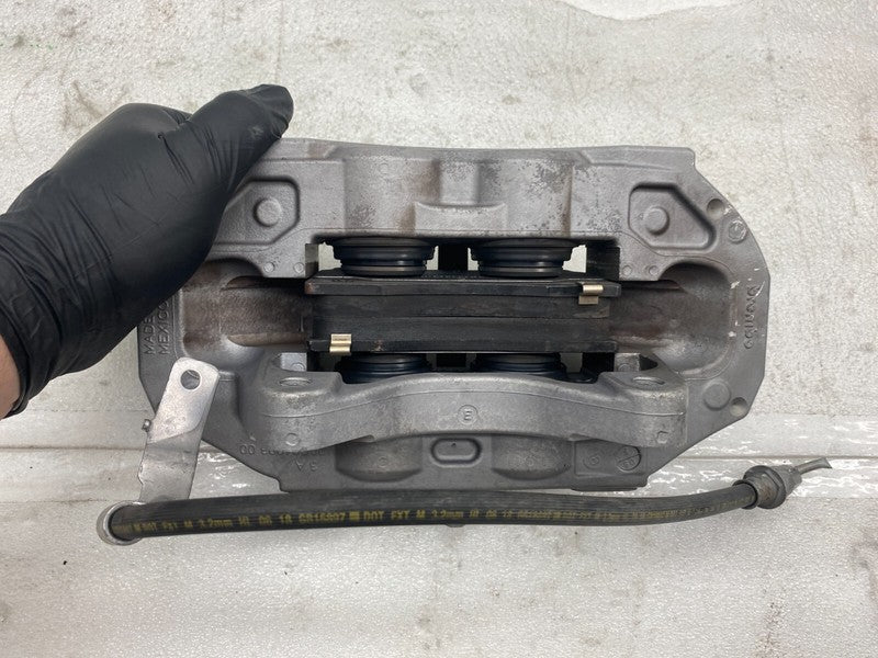 104462100D ⭕ 2017-2023 Model 3 Front Left Caliper w/ Brake Hose Line Left Base 1044621-00-D