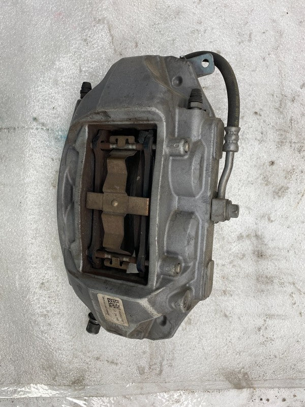 104462100D ⭕ 2017-2023 Model 3 Front Left Caliper w/ Brake Hose Line Left Base 1044621-00-D
