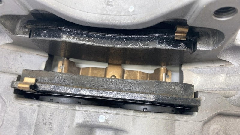 104462100E ⭕ 2017-2023 Tesla Model 3 Front Driver Side Brake Caliper Left Assy 1044621-00-E