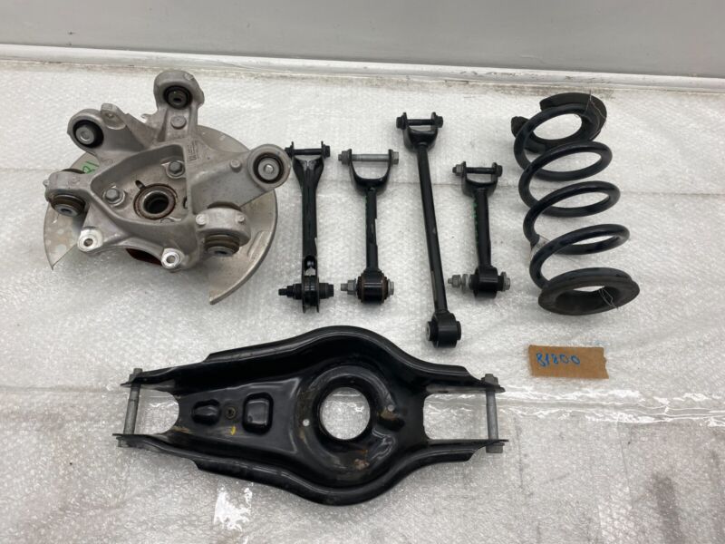 2017-2023 Tesla Model 3 Rear Left Knuckle Wheel Hub Fore Toe AFT Link Spring OEM