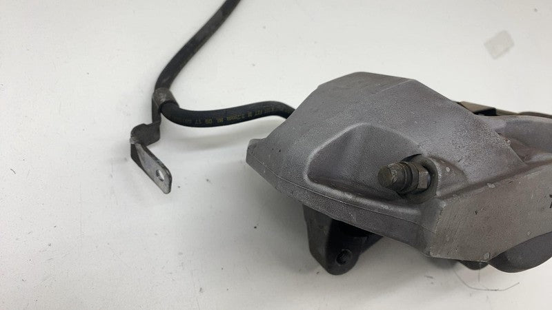 1044621-00-D ⭕ 2017-2023 Tesla Model 3 Front Left Caliper w/ Brake Hose Line LH 1044621-00-D