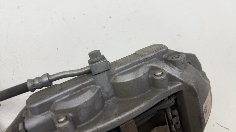 104462100E ⭕ 2017-2023 Tesla Model 3 Front Left Caliper w/ Brake Hose Line LH 1044621-00-E