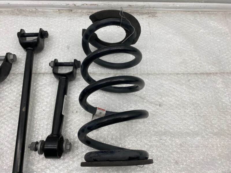 2017-2023 Tesla Model 3 Rear Left Knuckle Wheel Hub Fore Toe AFT Link Spring OEM