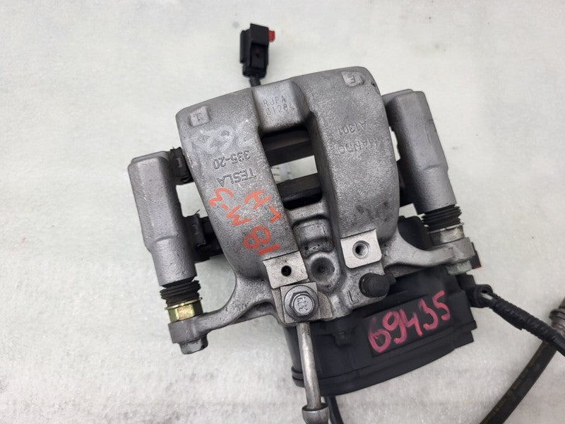104462397F ⭕ 2017-2025 Tesla Model 3 Rear Left Caliper w/ Brake Line Hose BASE 1044623-97-F
