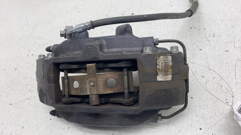 2012-2020 Tesla Model S MS Front Driver Side Caliper w/ Brake Hose Line Left OEM