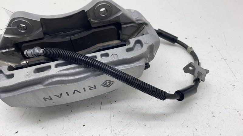⭕ 2025 Rivian R1S Front Driver Side Caliper w/ Brake Line Left OEM PT0