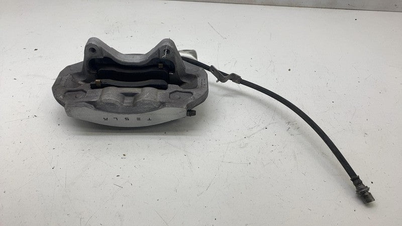 ⭕ 17-23 Tesla Model 3 Front Brake Caliper w/ Brake Hose Line Left 1044